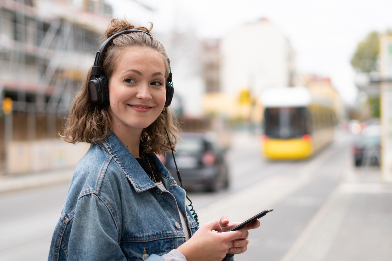 Person in the street calculating wage tax in Germany